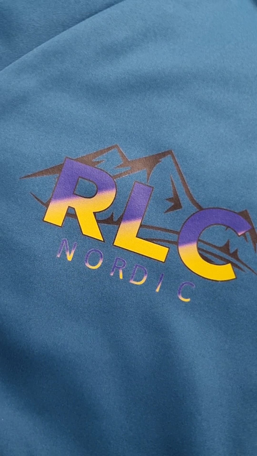 Tracksuits showcasing vibrant DTF prints, crafted by Workwear Works, with personalisation options